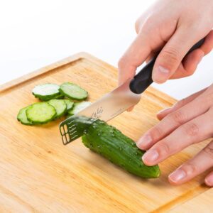 Seki Edge Butter Peeler and Knife SJ-K380 - cutting cucumbers