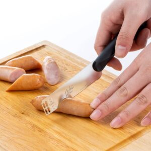 Seki Edge Butter Peeler and Knife SJ-K380 - cutting sausages