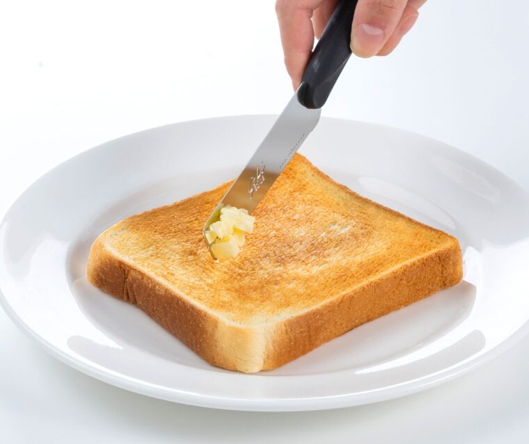 Seki Edge Butter Peeler and Knife SJ-K380 - spreading butter on toast