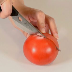 Seki Edge Knife and Kitchen Scissors SJ-K220 - cutting a tomato